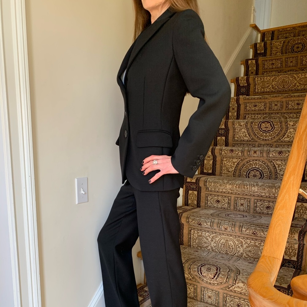 Black 100% virgin wool Moschino suit.